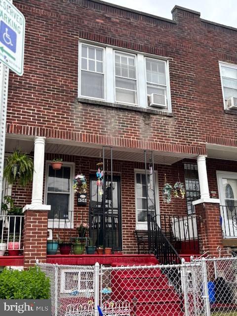 4546 N Palethorp St, Philadelphia, PA 19140 - view of exterior entry featuring covered porch and brick siding