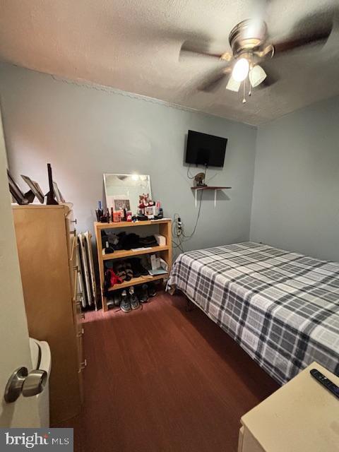 4546 N Palethorp St, Philadelphia, PA 19140 - bedroom featuring wood finished floors, a ceiling fan, and a textured ceiling
