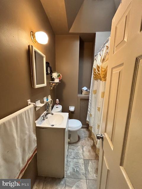 4546 N Palethorp St, Philadelphia, PA 19140 - full bath with vanity and a shower with shower curtain