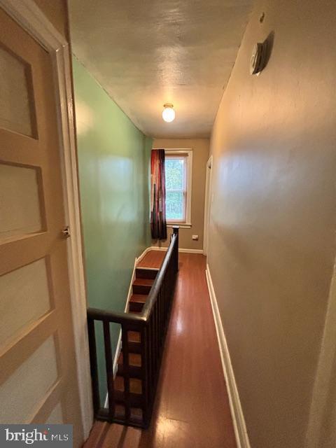 4546 N Palethorp St, Philadelphia, PA 19140 - corridor with an upstairs landing and wood finished floors