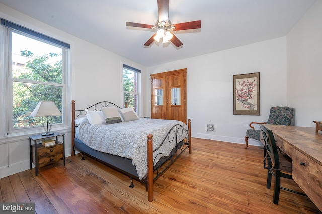 823 N 21st St, Philadelphia, PA 19130 - bedroom with light wood-type flooring and a ceiling fan