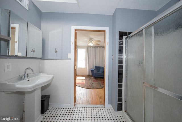 823 N 21st St, Philadelphia, PA 19130 - bathroom with a stall shower, tile patterned floors, and ceiling fan
