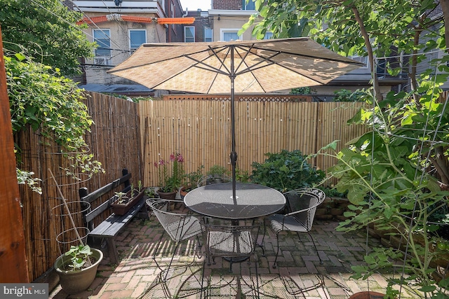 823 N 21st St, Philadelphia, PA 19130 - fenced backyard with a patio, outdoor dining space, and a grill