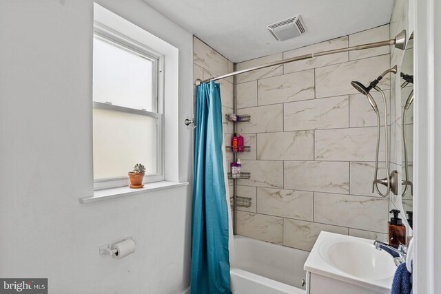 1645 S Carlisle St, Philadelphia, PA 19145 - bathroom featuring shower / tub combo with curtain and vanity