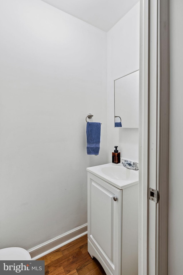 1645 S Carlisle St, Philadelphia, PA 19145 - bathroom featuring vanity and wood finished floors