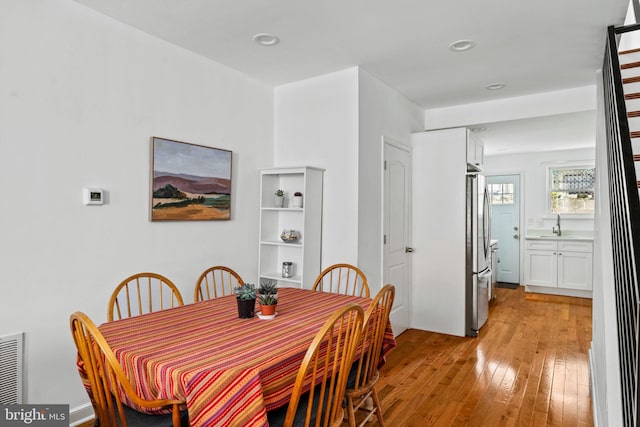 1645 S Carlisle St, Philadelphia, PA 19145 - dining space featuring light wood finished floors and recessed lighting