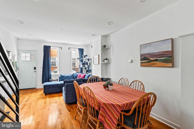 1645 S Carlisle St, Philadelphia, PA 19145 - dining room featuring plenty of natural light, light wood-type flooring, stairs, and recessed lighting