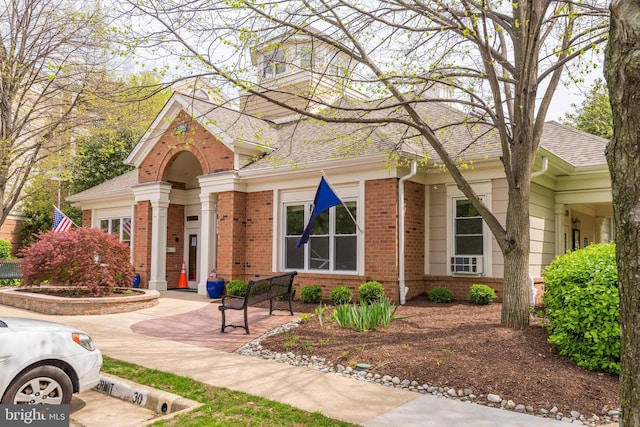 2204 Westcourt Ln Unit 313, Herndon, VA 20170 - view of front facade with brick siding and a shingled roof