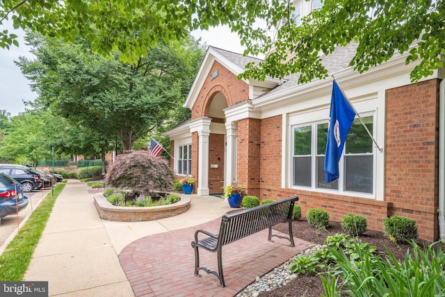 2204 Westcourt Ln Unit 313, Herndon, VA 20170 - view of front facade with brick siding and roof with shingles