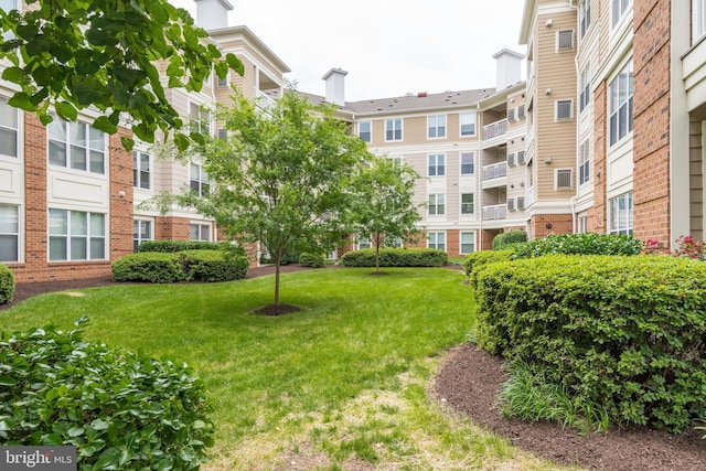 2204 Westcourt Ln Unit 313, Herndon, VA 20170 - surrounding community featuring a lawn