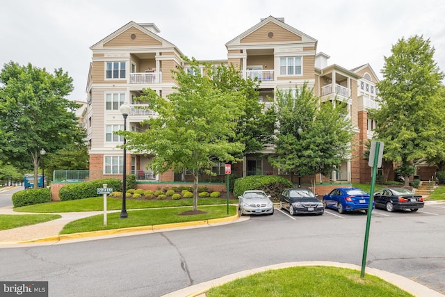 2204 Westcourt Ln Unit 313, Herndon, VA 20170 - view of property featuring uncovered parking