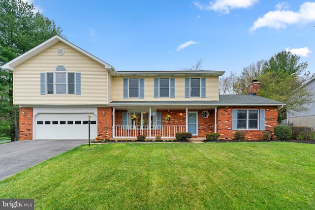 6212 Monroe Ave, Sykesville, MD 21784 - view of front of property with asphalt driveway, a porch, brick siding, and a front lawn