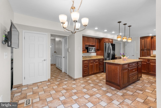 6212 Monroe Ave, Sykesville, MD 21784 - kitchen featuring appliances with stainless steel finishes, pendant lighting, a chandelier, a kitchen island, and recessed lighting