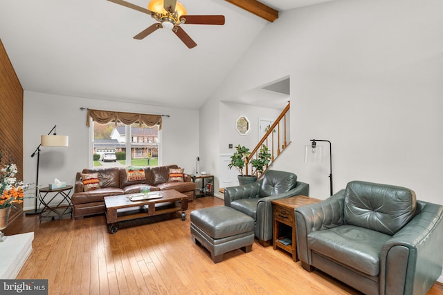 6212 Monroe Ave, Sykesville, MD 21784 - living room featuring high vaulted ceiling, ceiling fan, beam ceiling, light wood-style flooring, and stairway