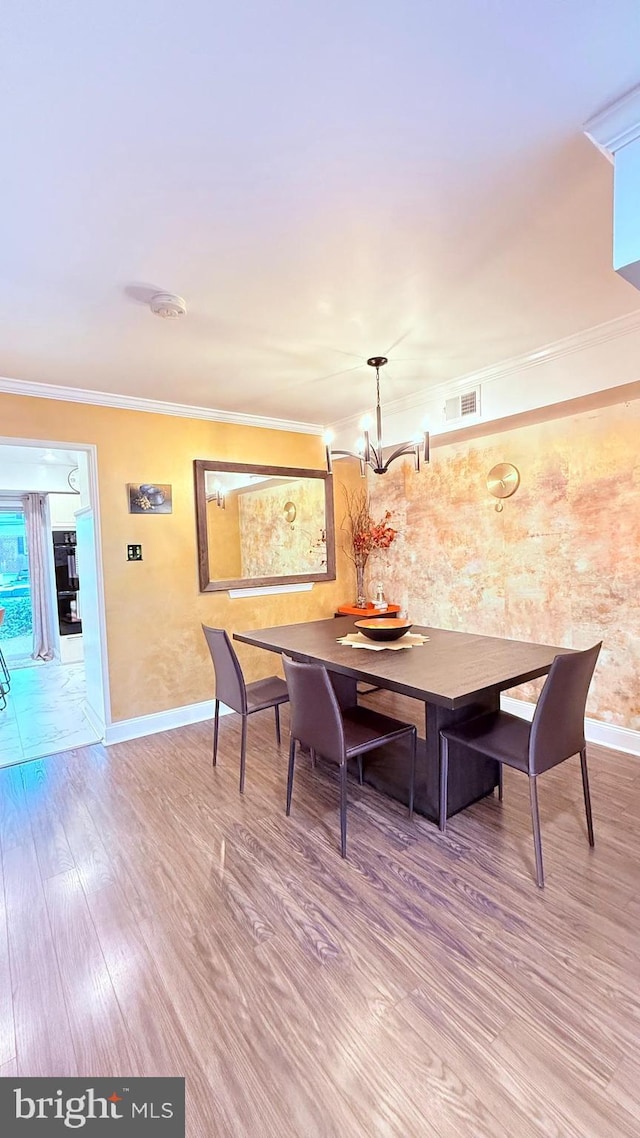 11881 Academy Rd Unit I6, Philadelphia, PA 19154 - dining room featuring wood finished floors, crown molding, and a chandelier