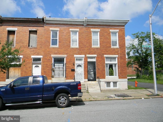 1404 N Montford Ave, Baltimore, MD 21213 - view of property featuring brick siding