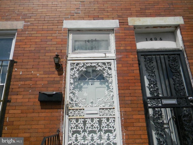 1404 N Montford Ave, Baltimore, MD 21213 - doorway to property with brick siding