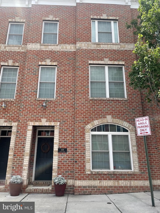 1416 Lowman St, Baltimore, MD 21230 - view of front of house featuring brick siding