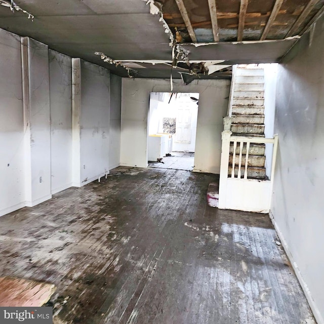 3123 Mcelderry St, Baltimore, MD 21205 - unfinished basement featuring wood-type flooring and stairway