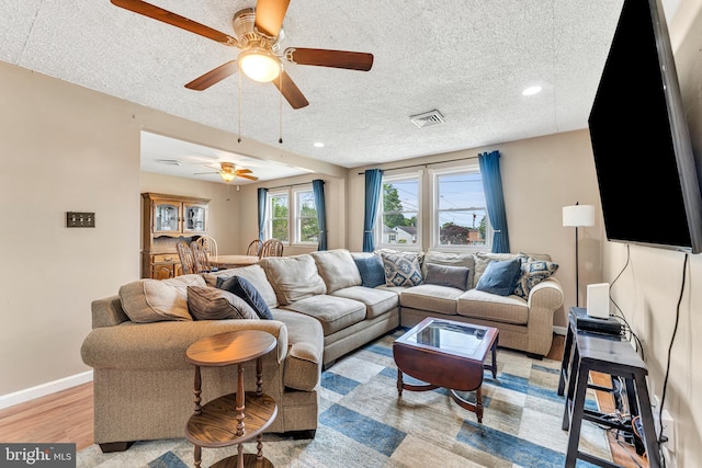 600 Central Ave, Runnemede, NJ 08078 - living room featuring light wood-style flooring, a textured ceiling, ceiling fan, and recessed lighting