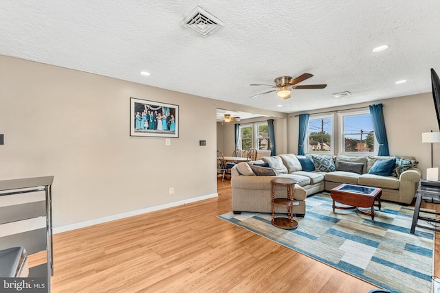 600 Central Ave, Runnemede, NJ 08078 - living room with ceiling fan, light wood-style floors, a textured ceiling, and recessed lighting