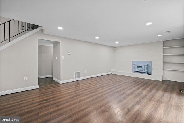 5908 Michael Rd, Waldorf, MD 20601 - unfurnished living room featuring wood finished floors, recessed lighting, stairs, and built in features