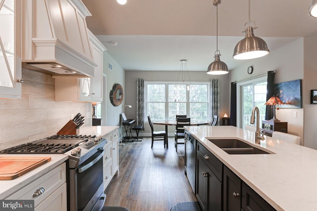 17 Beckleys Cor, Lebanon, PA 17042 - kitchen featuring stainless steel appliances, white cabinets, dark wood-style floors, custom range hood, and tasteful backsplash