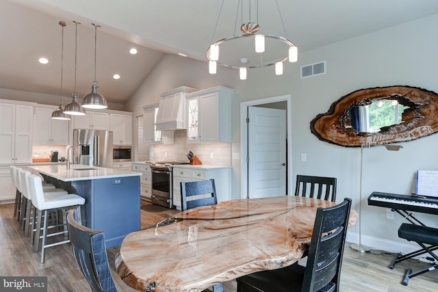 17 Beckleys Cor, Lebanon, PA 17042 - dining room featuring light wood-style floors, recessed lighting, and high vaulted ceiling