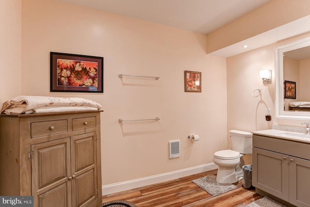 17 Beckleys Cor, Lebanon, PA 17042 - bathroom featuring vanity, wood finished floors, and heating unit