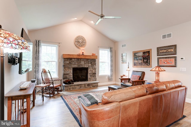 17 Beckleys Cor, Lebanon, PA 17042 - living room featuring ceiling fan, plenty of natural light, a stone fireplace, light wood-type flooring, and recessed lighting