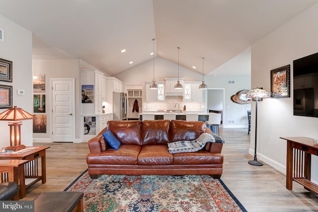 17 Beckleys Cor, Lebanon, PA 17042 - living room with light wood-style flooring, high vaulted ceiling, recessed lighting, and wine cooler
