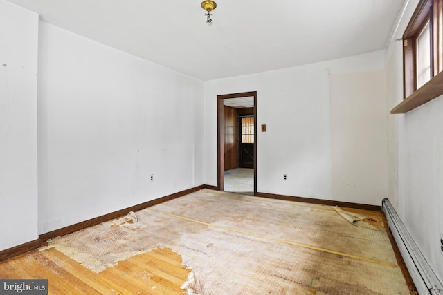 210 S Pennell Rd, Media, PA 19063 - unfurnished room featuring a baseboard heating unit and plenty of natural light