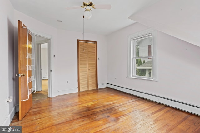 210 S Pennell Rd, Media, PA 19063 - unfurnished bedroom with a baseboard heating unit, light wood-type flooring, and a closet