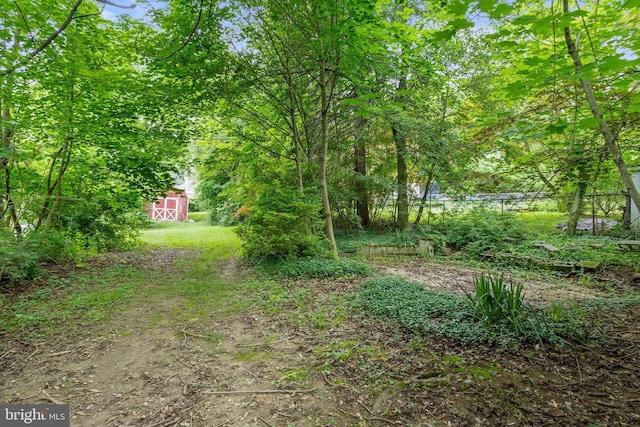 210 S Pennell Rd, Media, PA 19063 - view of yard featuring an outdoor structure and a barn