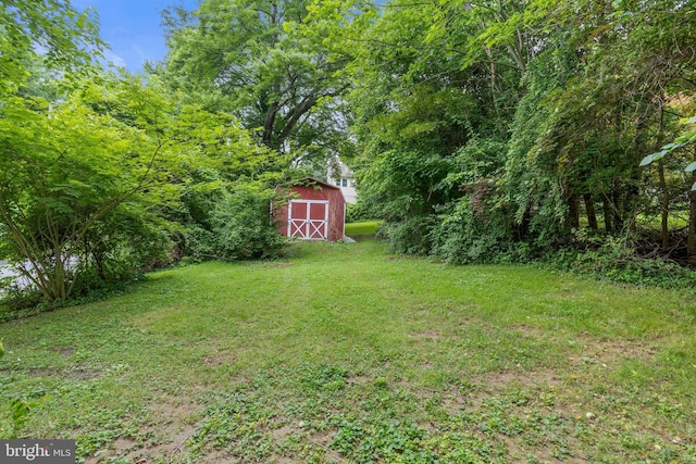 210 S Pennell Rd, Media, PA 19063 - view of green lawn with an outdoor structure and a barn