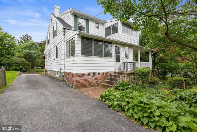 210 S Pennell Rd, Media, PA 19063 - view of front of house featuring a chimney