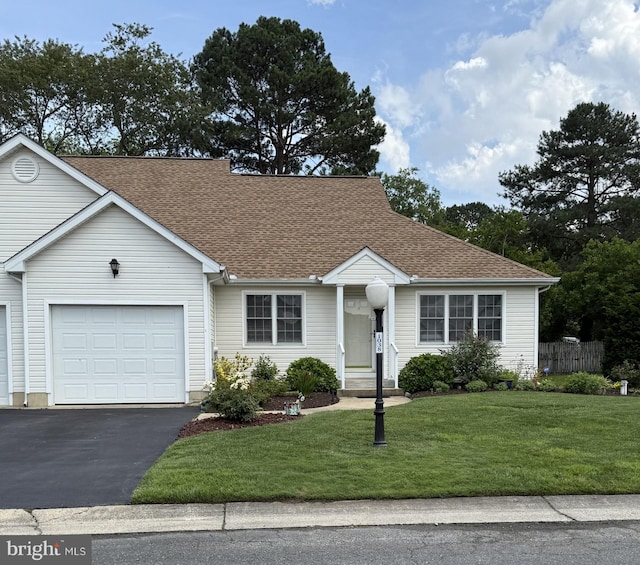 1038 E Schumaker Manor Dr, Salisbury, MD 21804 - view of front of property featuring roof with shingles, asphalt driveway, and a garage