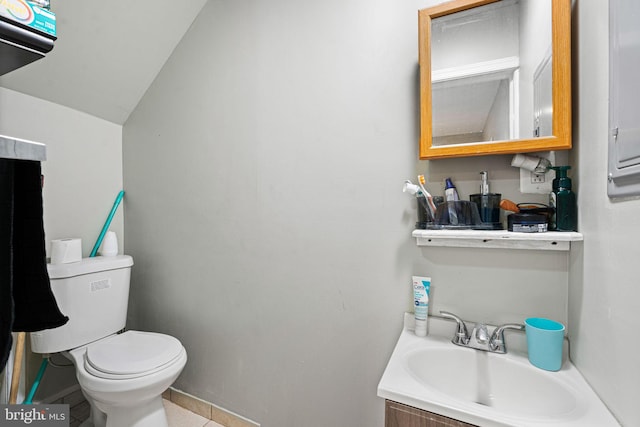 523 W Venango St, Philadelphia, PA 19140 - bathroom featuring vanity, tile patterned flooring, and vaulted ceiling