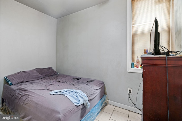 523 W Venango St, Philadelphia, PA 19140 - bedroom with light tile patterned flooring and multiple windows