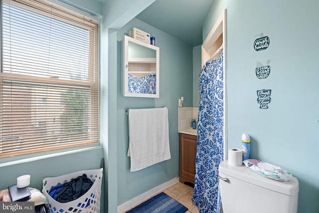523 W Venango St, Philadelphia, PA 19140 - bathroom featuring tile patterned flooring and plenty of natural light