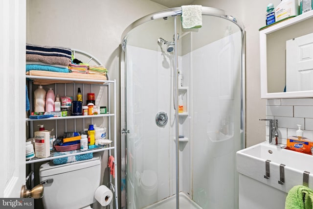 523 W Venango St, Philadelphia, PA 19140 - bathroom featuring a shower stall and tasteful backsplash