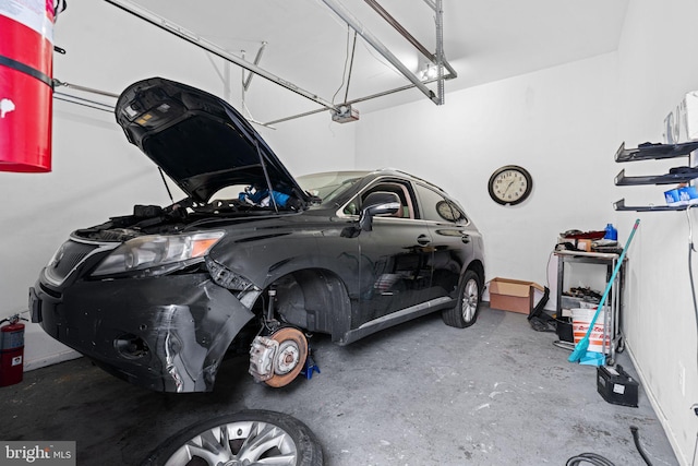 523 W Venango St, Philadelphia, PA 19140 - garage featuring a garage door opener