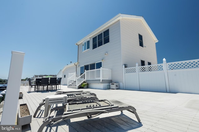 32 Lake Singleton Ct, Tuckerton, NJ 08087 - rear view of property featuring a deck and outdoor dining area