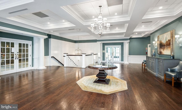 5230 Canyon Creek Way, Haymarket, VA 20169 - hallway featuring a chandelier, french doors, a decorative wall, an upstairs landing, and ornate columns