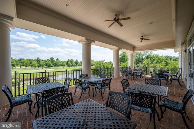 5230 Canyon Creek Way, Haymarket, VA 20169 - view of patio / terrace with outdoor dining space, a water view, ceiling fan, and view of wooded area
