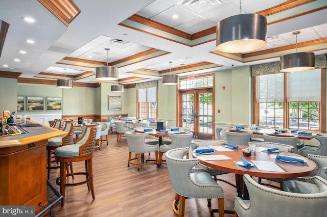 5230 Canyon Creek Way, Haymarket, VA 20169 - dining room featuring ornamental molding, coffered ceiling, a wainscoted wall, plenty of natural light, and a decorative wall