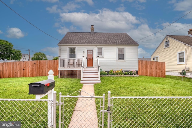 46 Avalon Ave, Dundalk, MD 21222 - view of front of home with a gate, roof with shingles, and a chimney