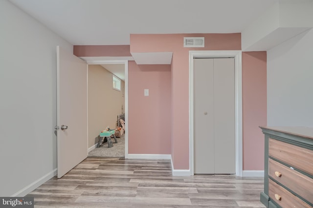 46 Avalon Ave, Dundalk, MD 21222 - unfurnished bedroom featuring light wood-type flooring and a closet