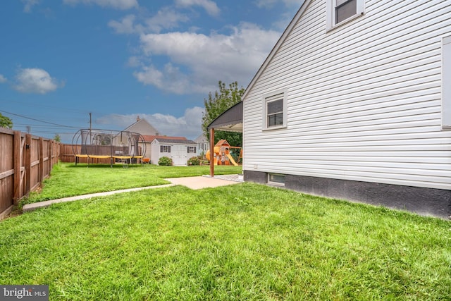 46 Avalon Ave, Dundalk, MD 21222 - view of yard featuring a playground and a trampoline