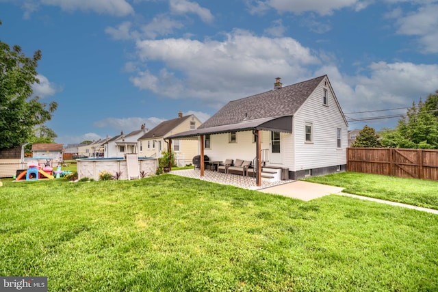 46 Avalon Ave, Dundalk, MD 21222 - rear view of house with entry steps, a patio area, roof with shingles, and a chimney